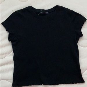 black ruffled shirt